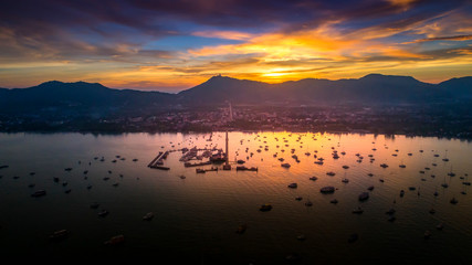 Wall Mural - Top View Tropical Island , Aerial view of port at sunset, Landscape with boat.