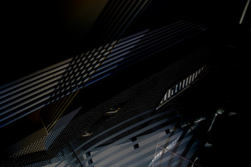Poster - Collage photo of modern office architecture in darkness. Generic architectural elements. Grunge structure of building interior with lath ceiling, glass walls and perforated metal panels.