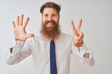 Poster - Young redhead irish businessman standing over isolated white background showing and pointing up with fingers number seven while smiling confident and happy.