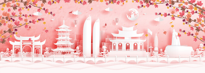 Fototapete - Autumn in Xiamen, China with falling maple leaves and world famous landmarks in paper cut style vector illustration