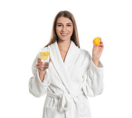 Canvas Print - Young woman with glass of lemon water on white background