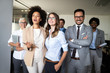 © NDABCREATIVITY - Successful business group of people at work in office