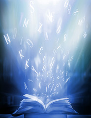 Poster - Imagine opening an old book blurred with magic power on the table and the English alphabet floating above the book with magic light as a beautiful background design.