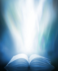 Poster - An ancient book that opens with magic, the magic light in the darkness on the wooden table, by the bright light shining down as the power to search for knowledge, religion and background