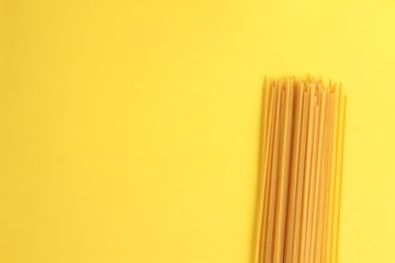 raw spaghetti pasta in colorful background