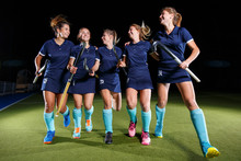 Five Field Hockey Players Celebrate The Victory