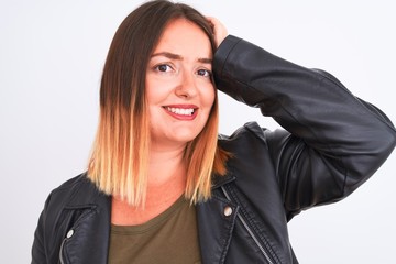 Wall Mural - Young beautiful woman wearing t-shirt and jacket standing over isolated white background stressed with hand on head, shocked with shame and surprise face, angry and frustrated. Fear and upset 