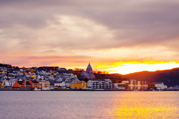 Wall Mural - View of city center of Kristiansund, Norway during the cloudy morning at sunrise