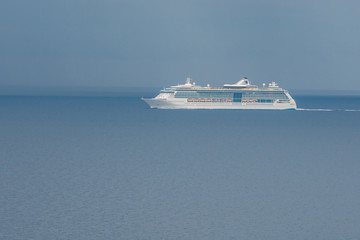 Distant view of touristic ship in the mediterranean sea. Travel.