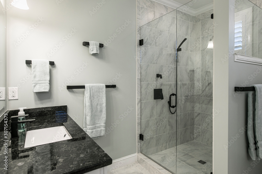 Simple luxury bathroom with granite and marble in residential home or hotel. - obrazy, fototapety, plakaty 