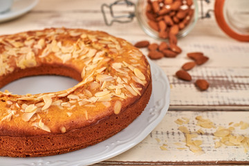 Almond cake on rustic white table