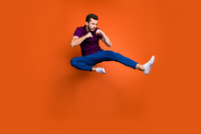 Full Length Body Size Profile Side Photo Of Serious Confident Man In Blue Trousers White Sneakers Kicking His Leg Forward To Protect Himself Isolated Vivid Color Background