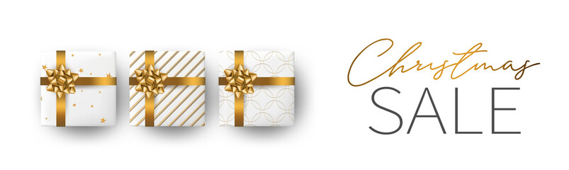 Christmas sale banner or header background. Xmas celebration white luxury design with presents. Winter holiday concept. Realistic gift boxes with gold ribbon and bow. Vector illustration.