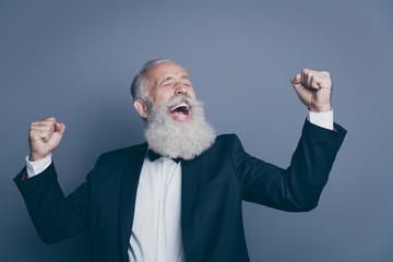 Sticker - Close-up portrait of his he nice attractive cheerful cheery overjoyed gray-haired man celebrating progress growth accomplishment breakthrough isolated over dark grey pastel color background