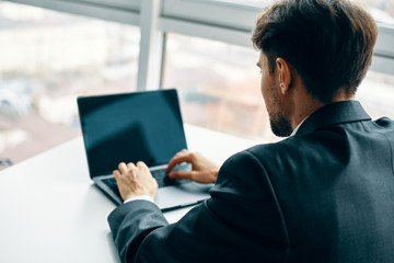 Wall Mural - man with tablet computer in the city