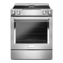 Slide-in Electric Range With Downdraft Isolated On White. Front View Of Stainless Steel Range Cooker With 4 Cooking Elements. Kitchen Stove With Four Burner Cooktop. Domestic And Household Appliances