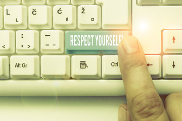 Writing note showing Respect Yourself. Business concept for believing that you good and worthy being treated well White pc keyboard with note paper above the white background