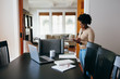 © Gerald Carter/Creative Flame - Professional woman working from home