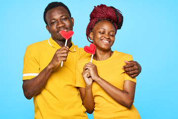 Wall Mural - cheerful young couple in t-shirts