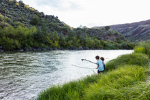 2 Boys Playing At The Edge Of The Rio Grande River, Pilar, NM.