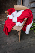 High Angle View Of Santa Claus Costume On A Chair.