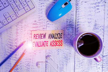 Wall Mural - conceptual hand writing showing review analyze evaluate assess. concept meaning evaluation of perfor