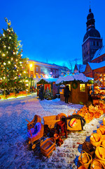 Sticker - Night Cityscape with Christmas Market at Dome Cathedral square in Winter Riga, Latvia. Advent Fair Decoration and Stalls with Crafts Items on the Bazaar. Latvian street Xmas and holiday