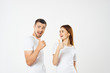 © SHOTPRIME STUDIO - cheerful young couple in t-shirts