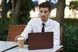 © SHOTPRIME STUDIO - businessman working on his laptop in the park