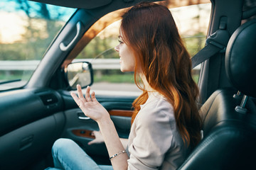 Wall Mural - young woman in car