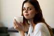 © SHOTPRIME STUDIO - young woman with cup of coffee