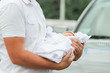 © yurolaitsalbert - father with his newborn baby standing near his car