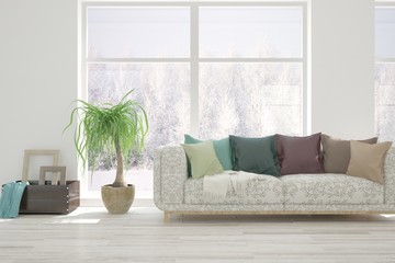 Stylish room in white color with sofa and winter landscape in window. Scandinavian interior design. 3D illustration