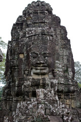 A statue with a face in the temple complex of Angkor Wat. Cambodia.