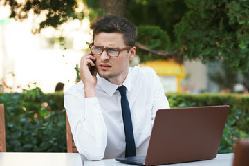 Poster - businessman talking on mobile phone