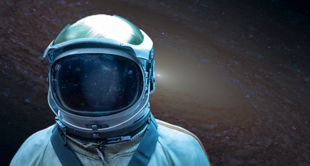 Astronaut in a front of stars in outer space. Conquest of Space Concept, Elements of this image were furnished by NASA