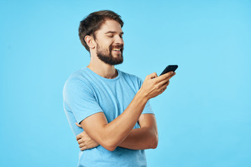 Wall Mural - young man with mobile phone