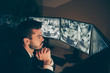 © deagreez - Close-up profile side view portrait of his he nice attractive focused man police skilled expert watching television cam supervising using panel at workplace workstation indoors