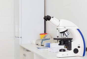 Poster - Close up of modern microscope on table with samples