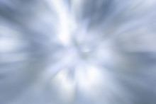 Blurred Lights White, Gray, Blue Background. Abstract Soft Explosion Effect. Centric Motion Pattern