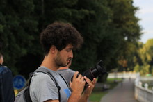 Photographer Amateur Profile Portrait With Camera In Street Walking Time In Park 