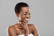 Beauty Portrait Of Joyful Black Woman Sincerely Laughing Over Gray Background