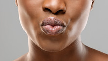 Unrecognizable Black Girl Pouting Her Beautiful Plump Lips