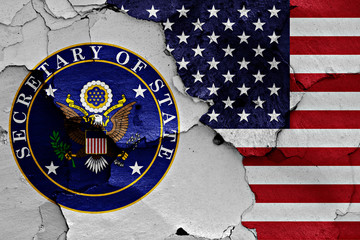 Wall Mural - flags of Secretary of State and USA painted on cracked wall