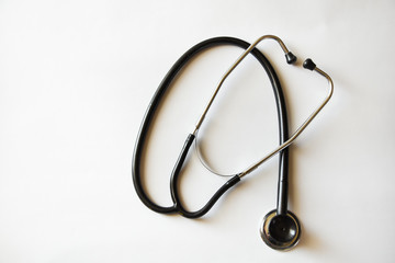 Medical stethoscope or phonendoscope in black isolated on white background 