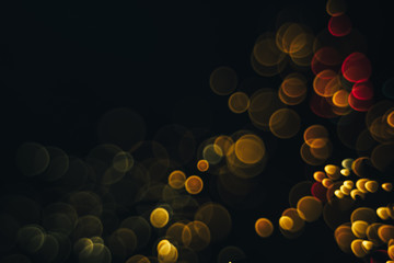 Poster - Beautiful magic gold and red bokeh background in the darkness.