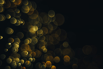 Poster - Beautiful magic gold bokeh background in the darkness.