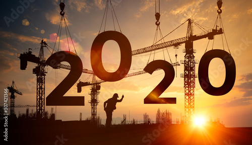 Fotomural Silhouette construction site,Cranes building construction 2020 year sign
