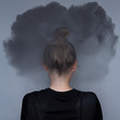 Girl with dark cloud on your head. Mental health care concept. Anxiety problem. Sad expression. Asian woman. Great design for any purposes. Stock photography.