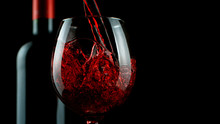 Detail Of Pouring Red Wine Into Glass